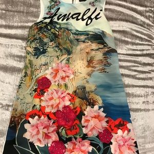 Supper stunning dress. Perfect condition. Wear once. 3d flowers snd stones